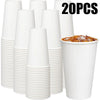 A stack of 20 white disposable paper coffee cups shown next to a single cup filled with an amber-colored drink.