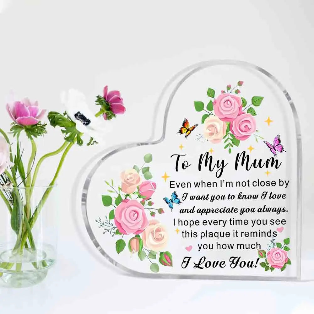 A heart-shaped acrylic keepsake plaque with pink and green floral designs and the text To My Mum and I Love You