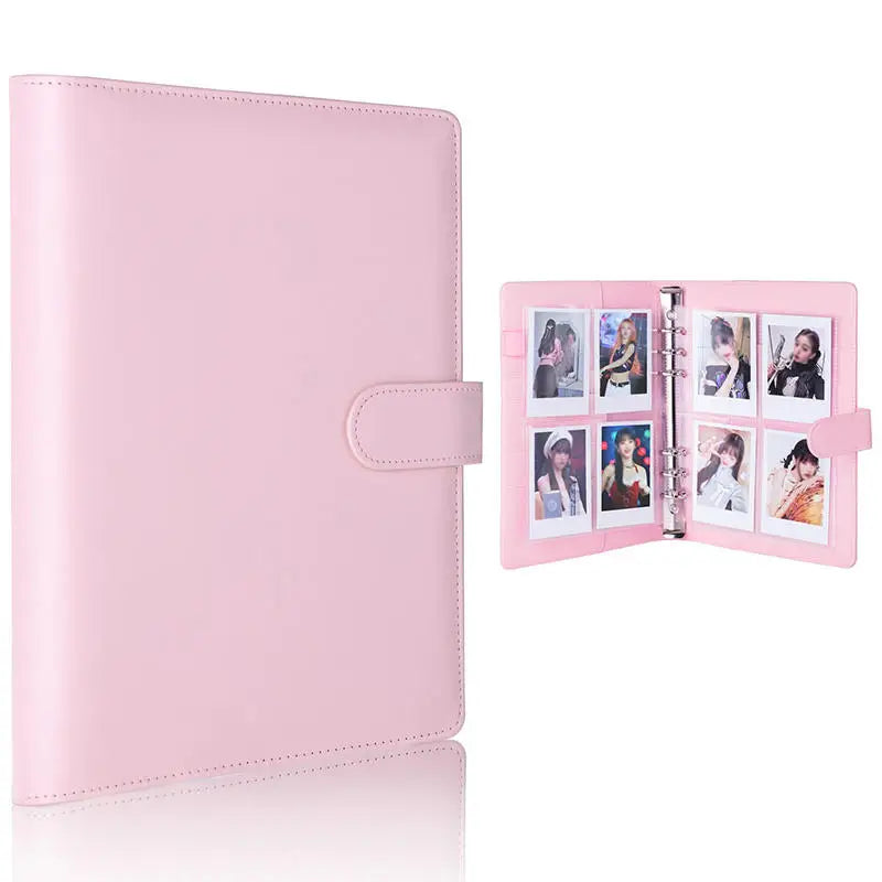 A pink A5 PU leather photocard binder with a clear plastic cover displaying several photos.