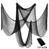 Black Halloween gauze netting or creepy cloth used for spooky party décor