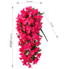 A vertical arrangement of bright pink artificial bougainvillea vine flowers used for home and wedding decor.