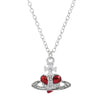 Silver pendant necklace featuring a vintage diamond-inlaid Saturn design.