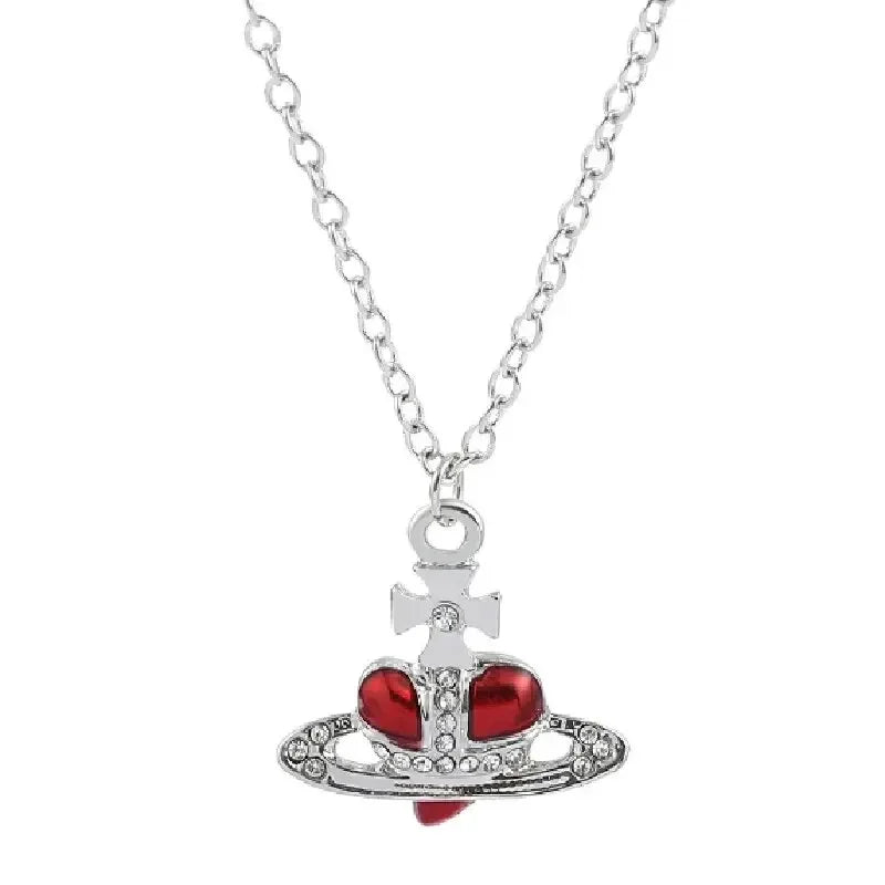 Silver pendant necklace featuring a vintage diamond-inlaid Saturn design.