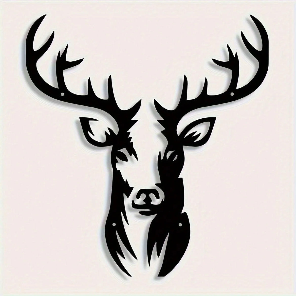 Black metal wall sculpture of a deer head with antlers.
