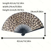 Leopard print folding hand fan with a black frame shown flat.