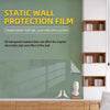 Static wall protection film applied to a glass surface in a modern interior setting.