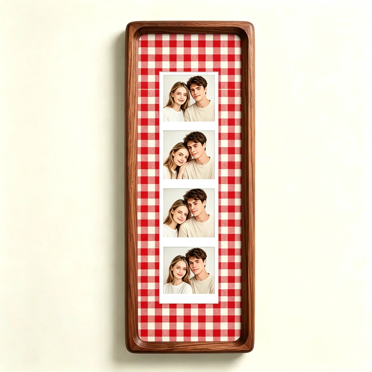 A wooden photo strip frame with a red and white checkered background displaying four portrait photos of a couple.