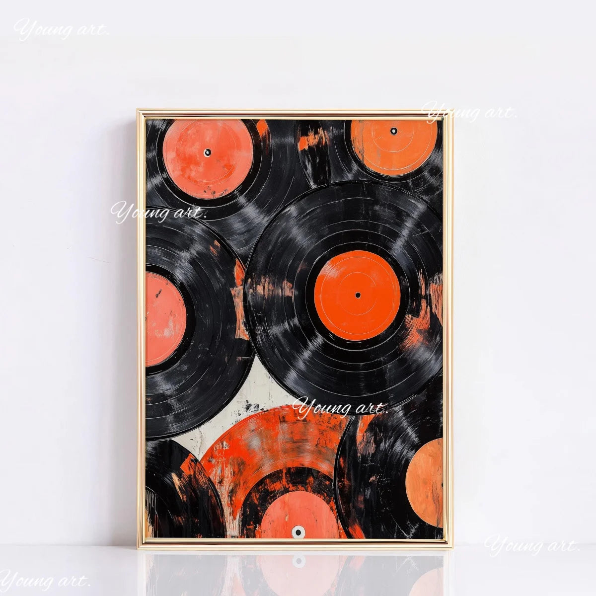 A framed canvas art print featuring overlapping vinyl records in black and orange tones.
