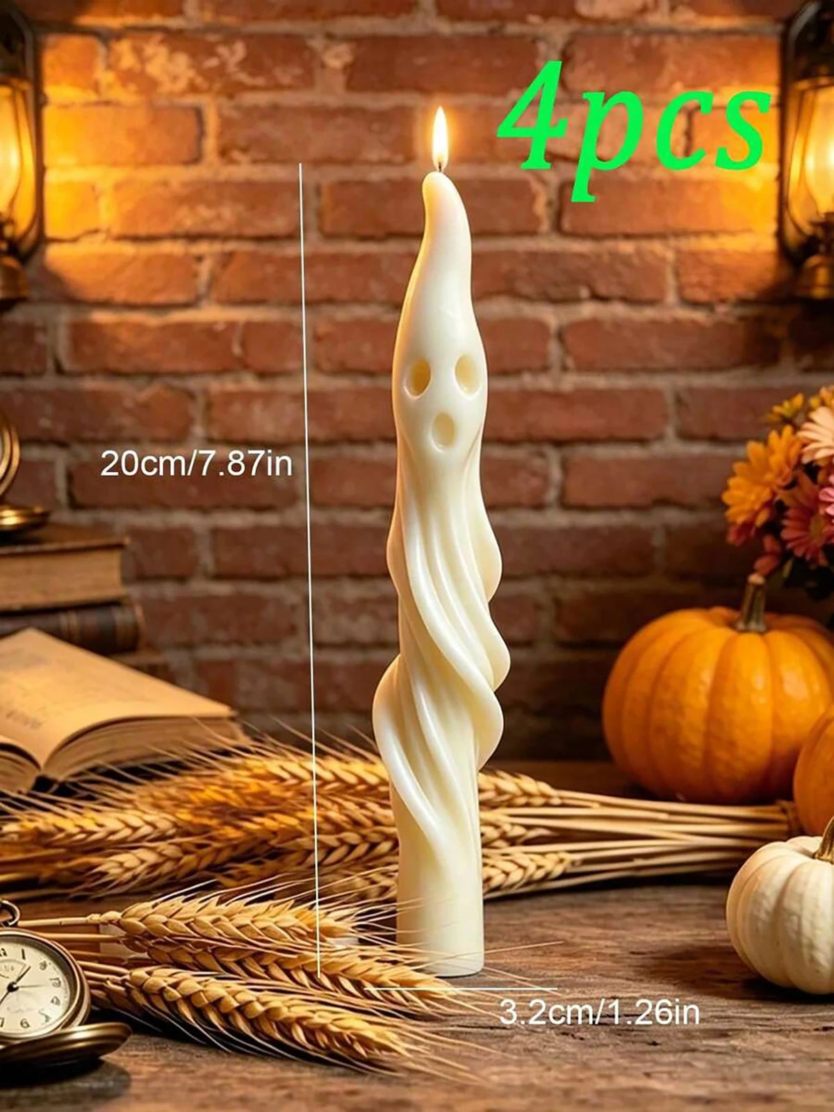 Four white soy candles shaped like ghosts and mummies displayed on a wooden surface with wheat stalks.