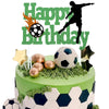 A green birthday cake decorated with soccer player toppers and field greenery.