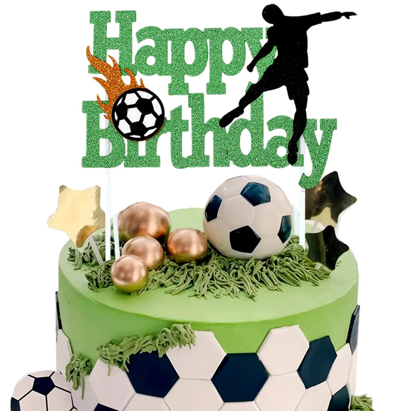 A green birthday cake decorated with soccer player toppers and field greenery.