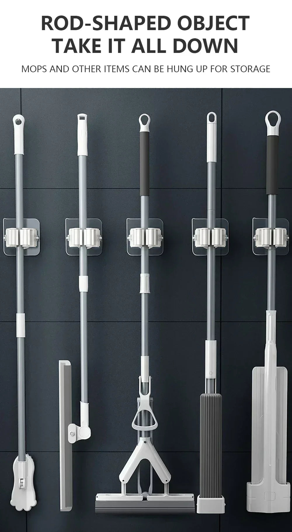 A collection of rod-shaped objects, including mops and brooms, are hung up for storage on a dark gray wall.