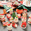 A collection of festive Santa Claus and snowman figurines for Christmas decor, including various colors and shapes.