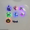 A collection of Halloween themed 3D wall stickers featuring spooky silhouettes and monsters illuminated by colorful LED light