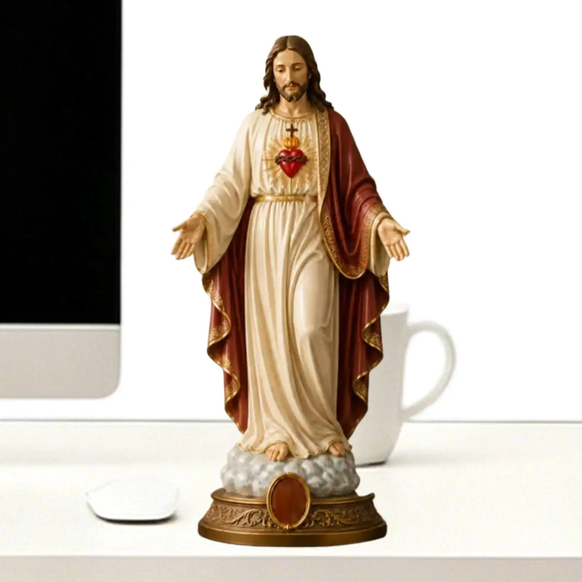 A religious figurine set depicting Jesus and the Blessed Mother, with Jesus holding a heart.