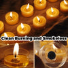 A collection of glowing yellow beeswax candles in various sizes and a glass tealight candle.