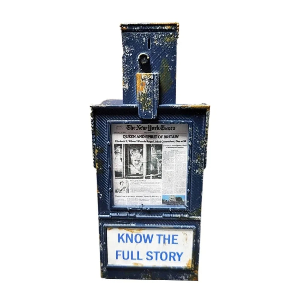 A vintage-style miniature payphone with a distressed blue and gold finish.