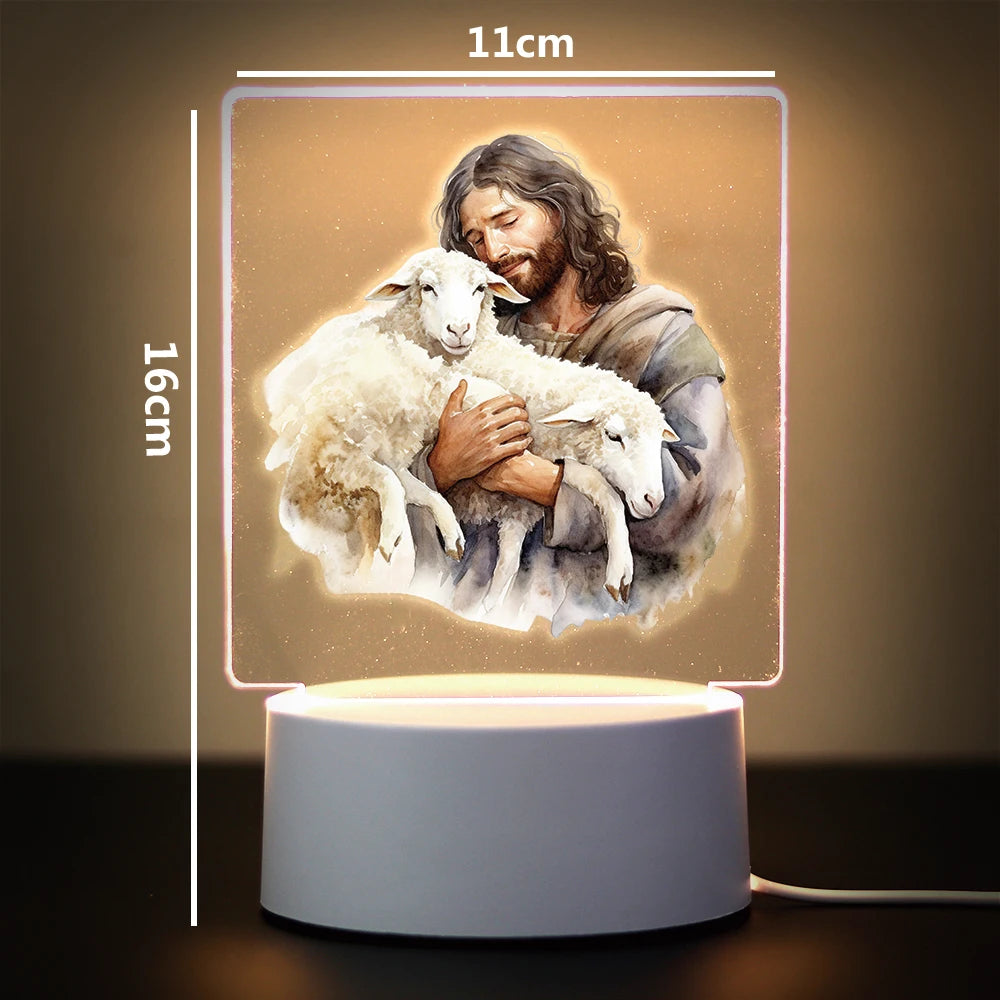 A 3D LED night light featuring a painting of Jesus holding a lamb, displayed on a white base.