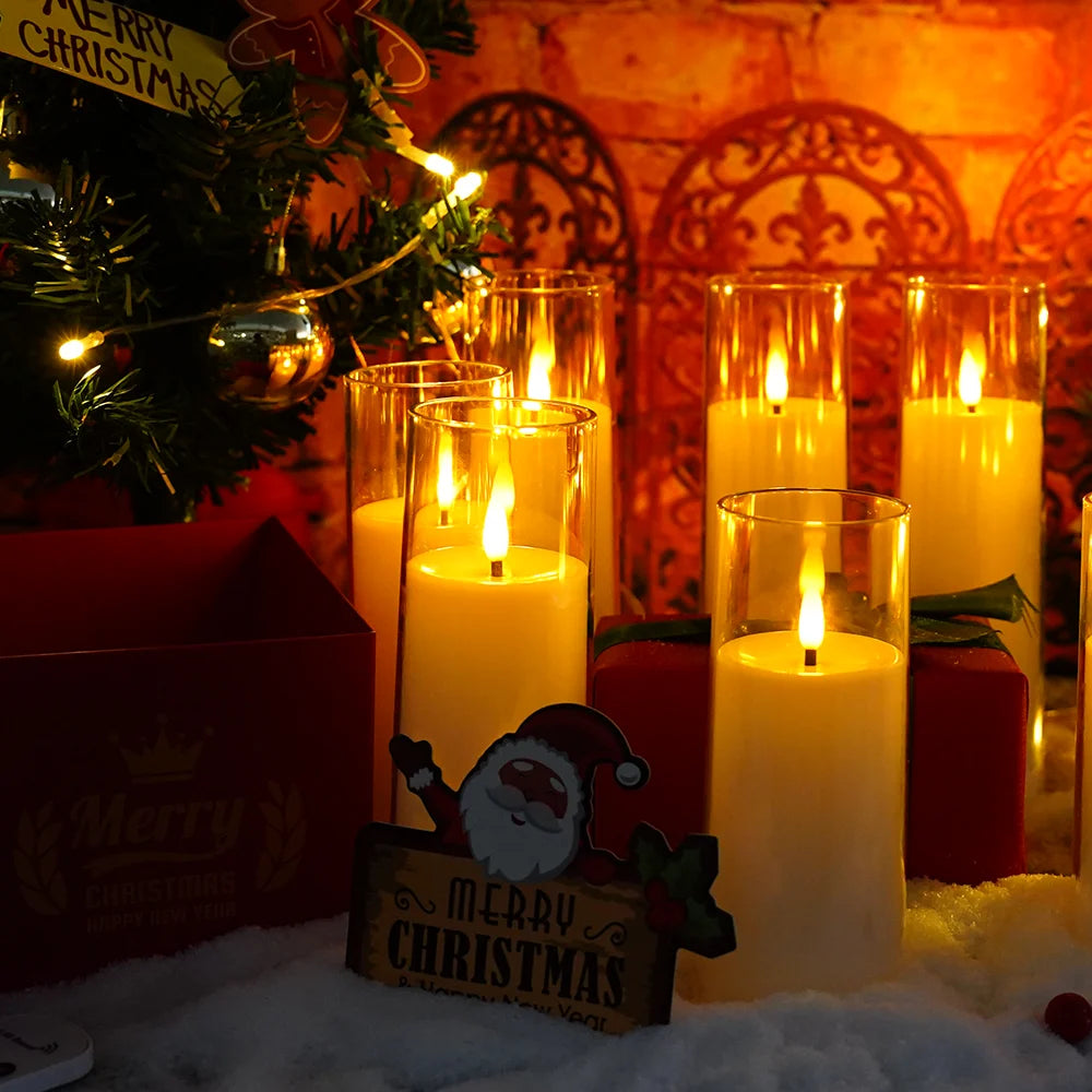 A festive display of five glowing yellow candles set against a dark background with holiday decorations.