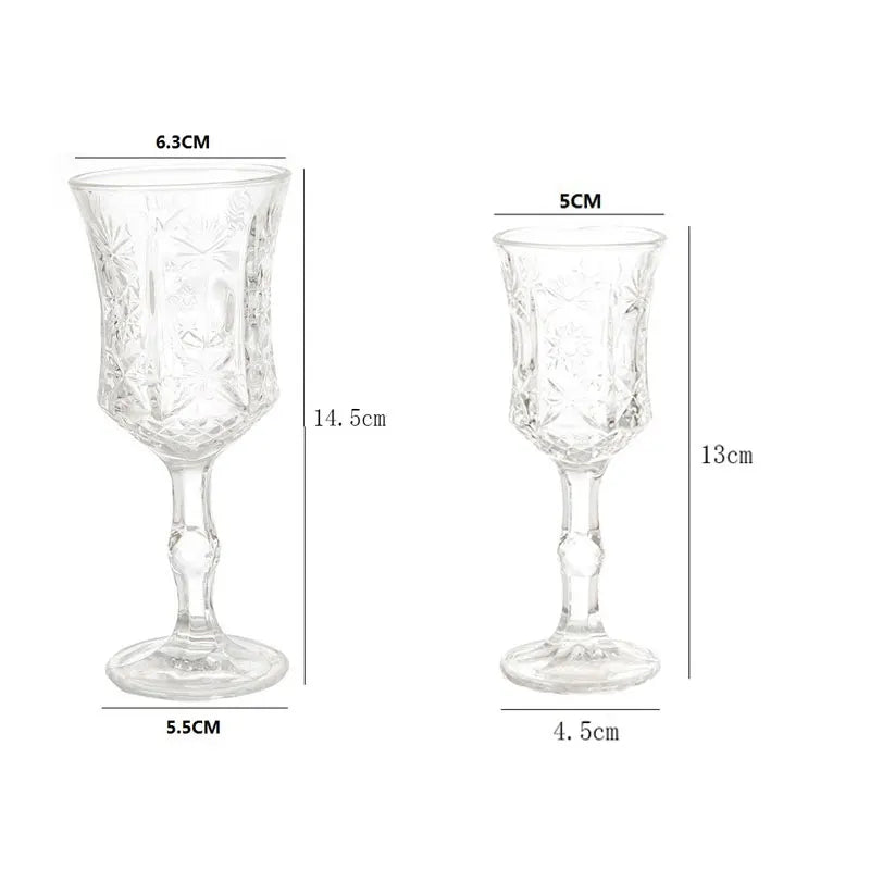 A pair of clear vintage French-style high-footed wine glasses shown with dimensions.