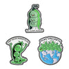 A set of enamel pins featuring cartoon characters and nature designs, including a pea character and a globe with peas on eart