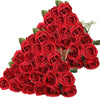 A bouquet of 50 deep red velvet artificial roses for weddings and home décor.