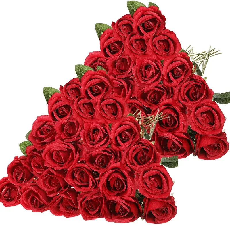A bouquet of 50 deep red velvet artificial roses for weddings and home décor.