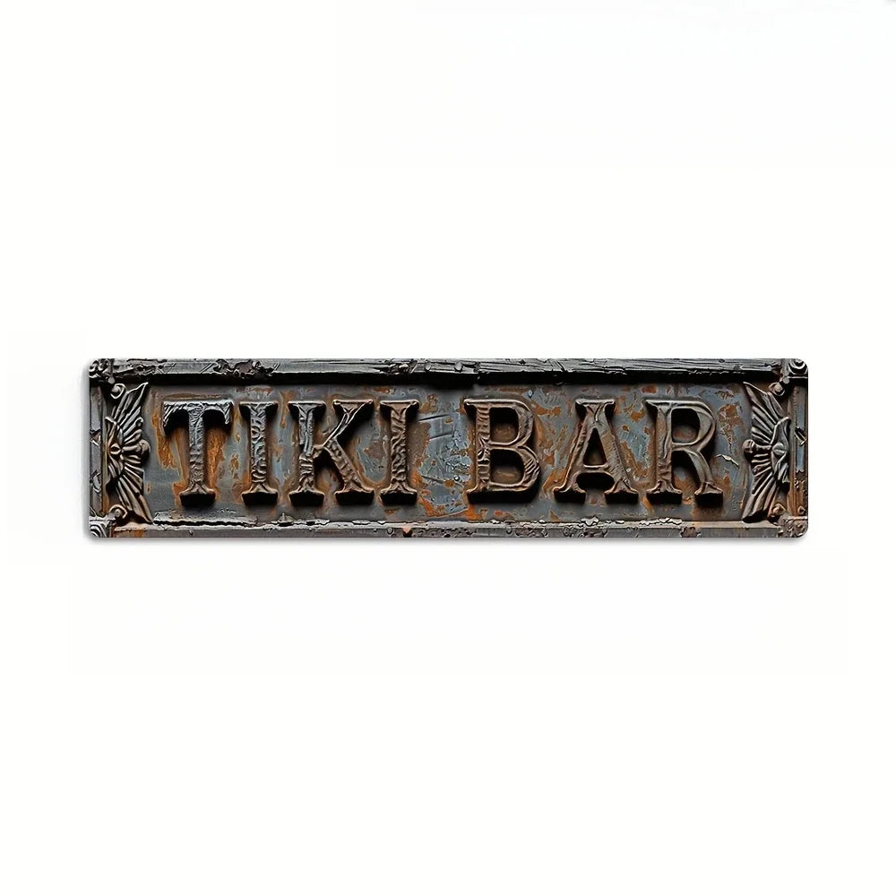 A rectangular, weathered metal sign with the words TIKI BAR embossed on it.