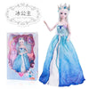 A detailed ball-jointed doll of a princess with light blue and white gown and makeup displayed in its packaging.