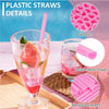 Pink plastic straws in various shapes including heart and round, shown with a cocktail glass.