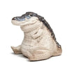 Handmade resin crocodile tea pet ornament with a textured, light beige and gray finish.