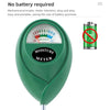 A green soil moisture meter with a needle indicating moist conditions, used for indoor plants.