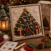 A framed Christmas 3D fabric poke art kit featuring a detailed festive tree decorated with gold and red elements.