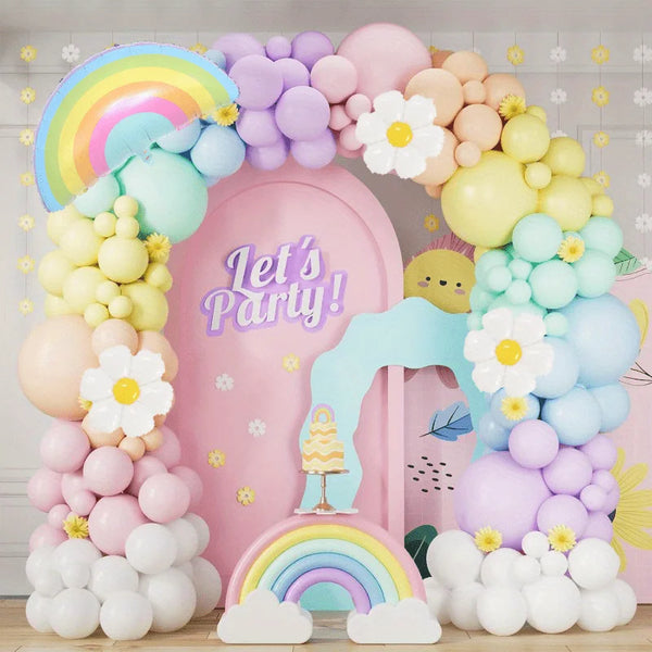 A balloon arch kit featuring pastel rainbow colored balloons and clouds for party decorations.