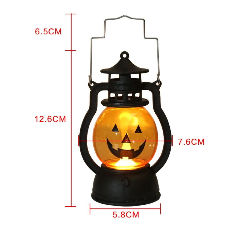 A black hanging lantern shaped like a carved jack-o'-lantern with an illuminated face.