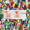 Assorted resin miniature figurines in various colors and shapes for DIY decor
