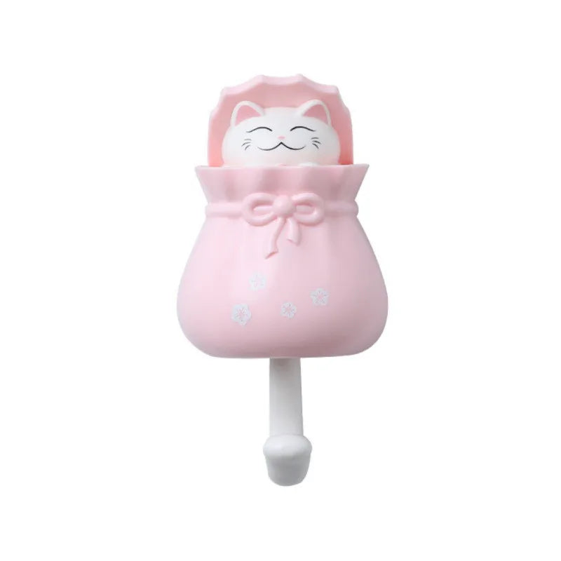 Pink cartoon cat wall hook with a cute face and bow for organization