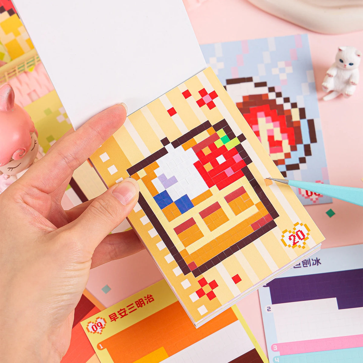 A hand is holding an open sheet of colorful die-cut stickers featuring cartoon characters and geometric patterns.