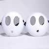 A pair of white Shy Guy cosplay masks with black eyes and a small nose, displayed against a white background.