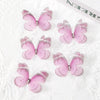 Pink translucent butterfly patches with silver embroidery on white lace