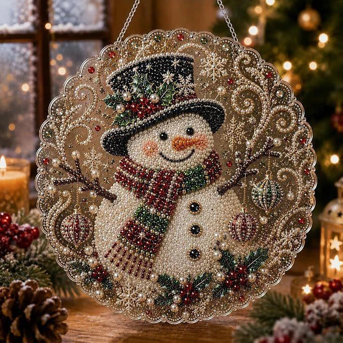 A detailed diamond painting of a smiling snowman wearing a festive hat and scarf surrounded by sparkling elements.