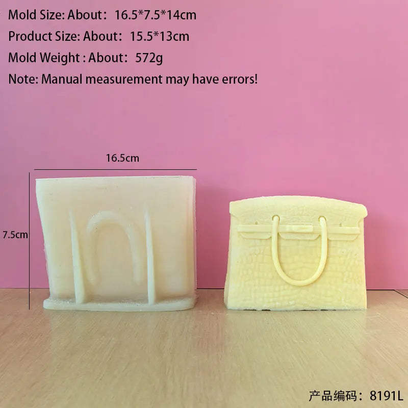 A rectangular silicone mold shaped like a handbag is shown against a pink wall.