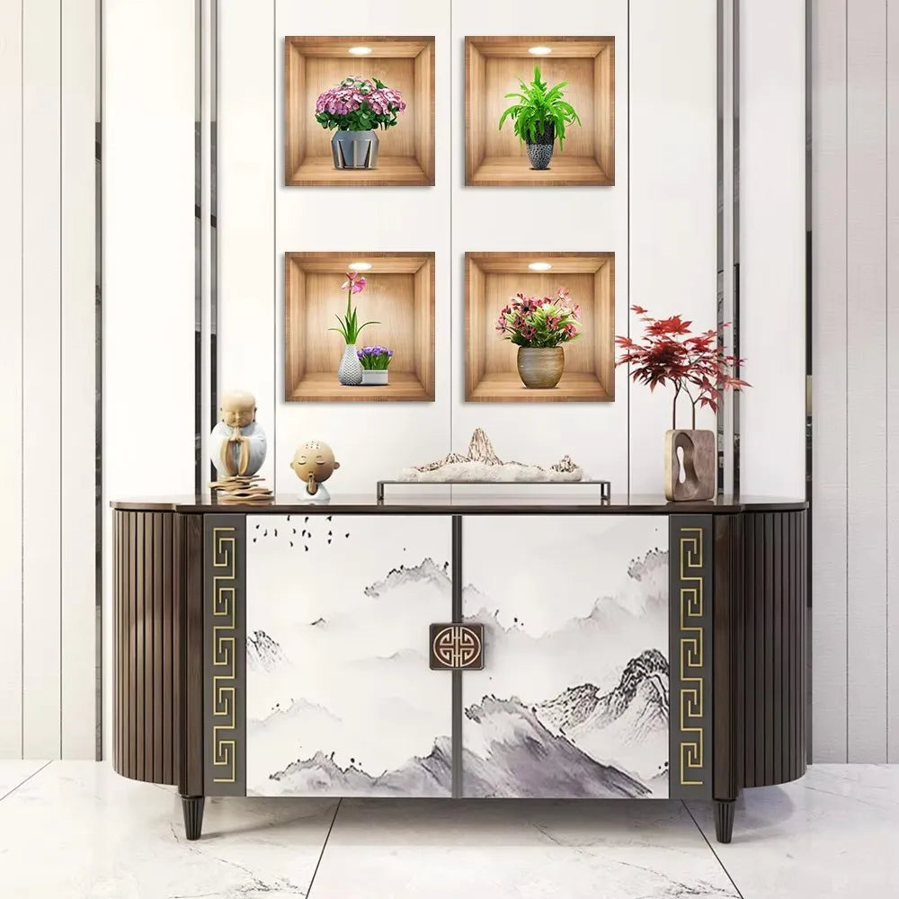 Présentation de plantes en pot et d'éléments décoratifs sur une armoire en bois foncé contre un mur blanc.