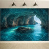 A vibrant turquoise sea cave entrance with lush green moss and sparkling water.