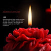 A close-up of a red rose-shaped scented candle burning, with text about selected materials visible.
