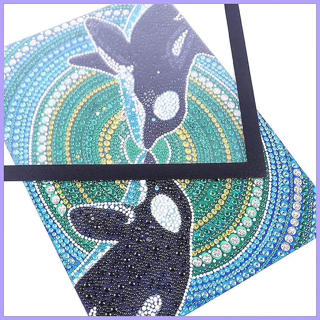 A vibrant mosaic artwork featuring a deer silhouette in shades of blue, green, and gold sequins on a square display frame.