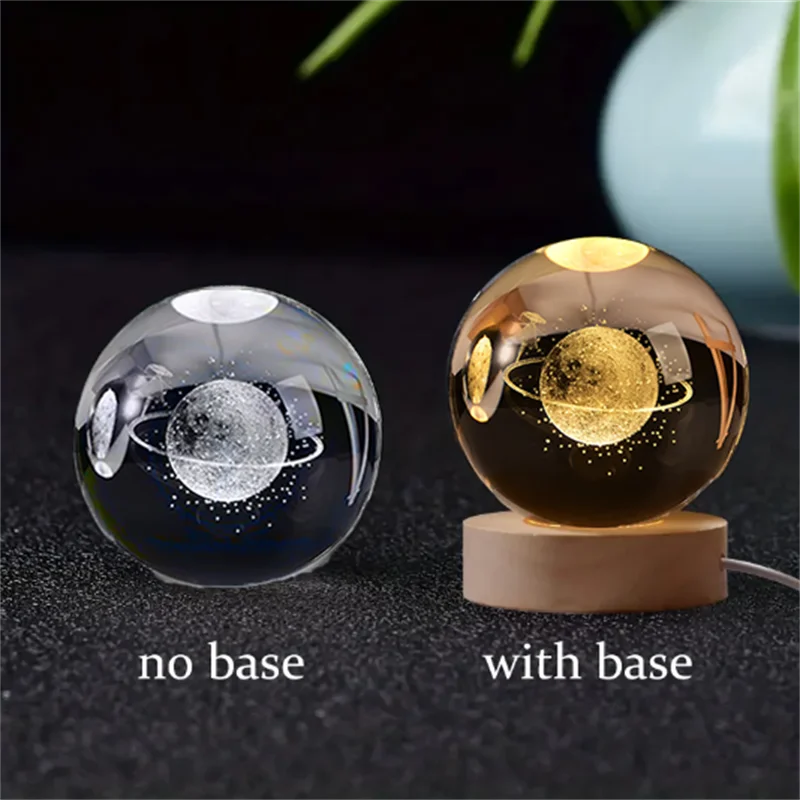 A comparison of a 3D crystal ball night light without a base and with a wooden base.