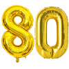 A large gold foil balloon shaped like the number 80 for celebrations.