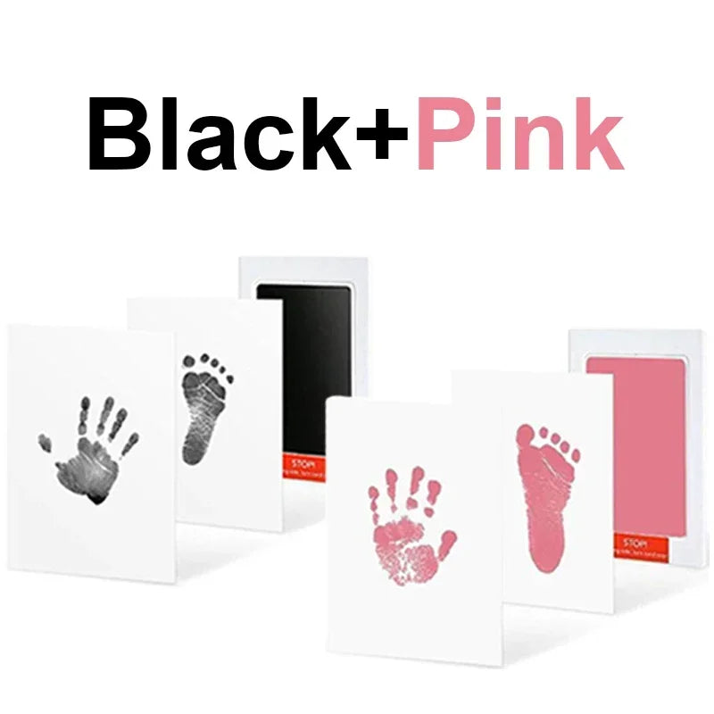 Black and Pink handprint and footprint ink pad kit featuring various colored prints on white paper.