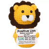 Handmade crochet lion baseball bat doll with a positive affirmation card
